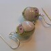 1 pair Sterling Silver Green and Pink Cutesy porcelain owl earrings.