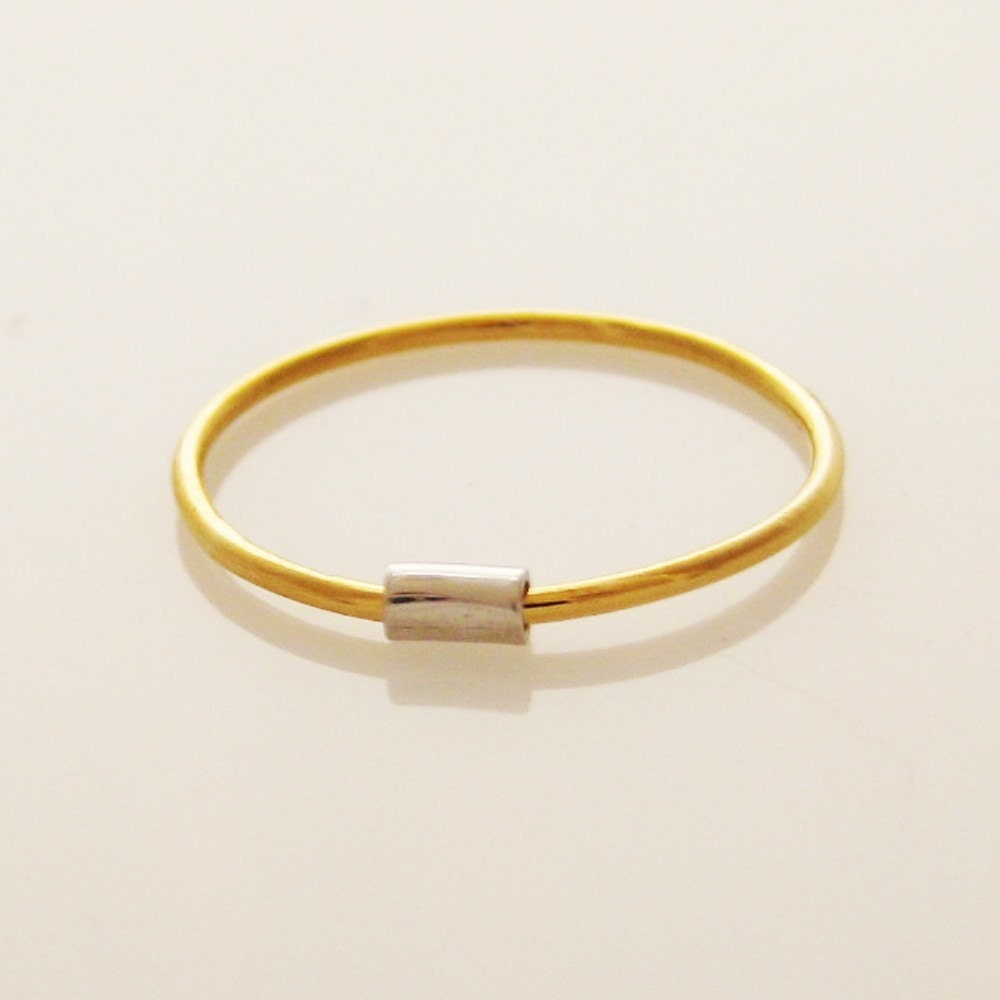 Spin, a Platinum and 22K Gold Ring