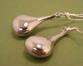 Silver dangle earrings.  Tear drops.