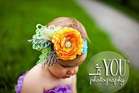 Yellow Ruffle Ranuculus Flower with Rhinestone Bling Center with Lime Feathers and Zebra Bow on Turquoise Lace Headband