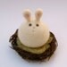 Easter Bunny Toy sitting on her nest . Very sweet and VERY cute . Needle Felted Wool