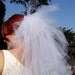 Peacock style wedding veil available in black. jagged, punky, couture