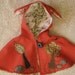 mouse ear cape with trees