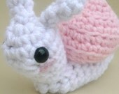 pink and white snail crochet amigurumi