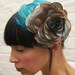 Metallic teal and light brown silk rose fascinator/headpiece with recycled turquoise feather wing