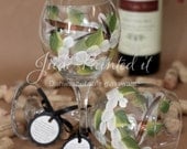 Hand painted wine glass in a white floral wrap around design - FREE personalization and dishwasher safe