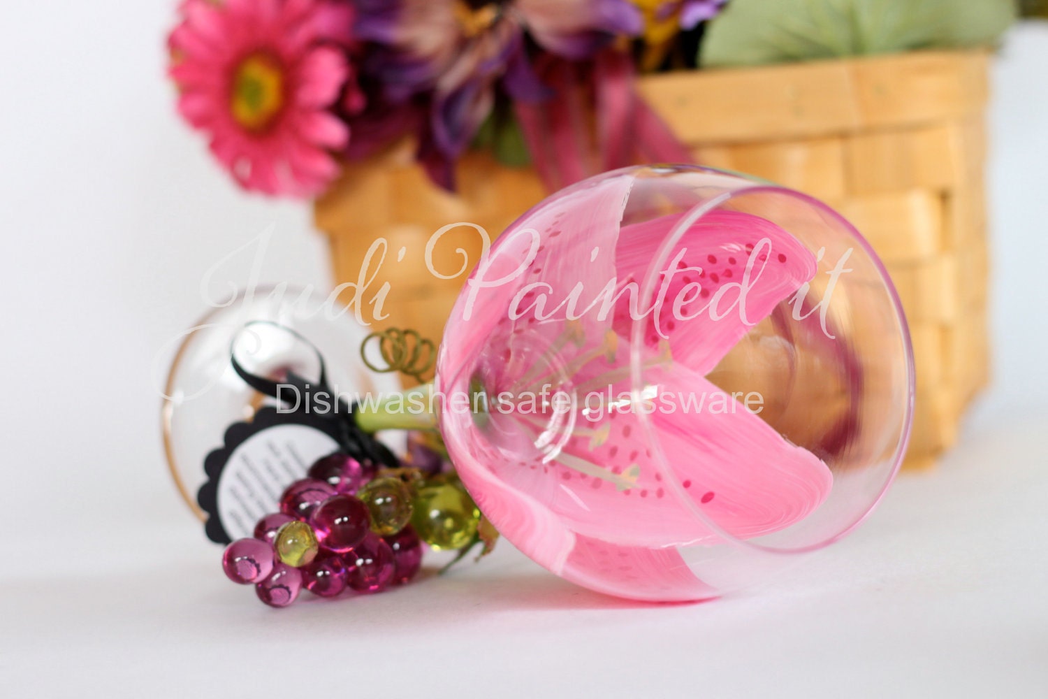 Stargazer lilly hand painted wine glass in a magenta color. FREE Personalization and Dishwasher safe