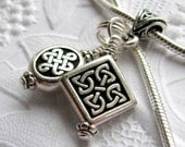 Celtic charm necklace, antiqued black silver pewter Tierra Cast,  ancient Druid, endless Celtic knot, Irish heritage
