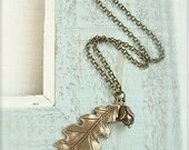 Antique brass oak leaf pendant necklace.  Glass beaded charm. Brown. Earthy jewelry by Sweet And Simple Jewelry Design.