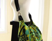 Extra large convertible backpack purse in bouquet green turquoise fabric with leather straps and base