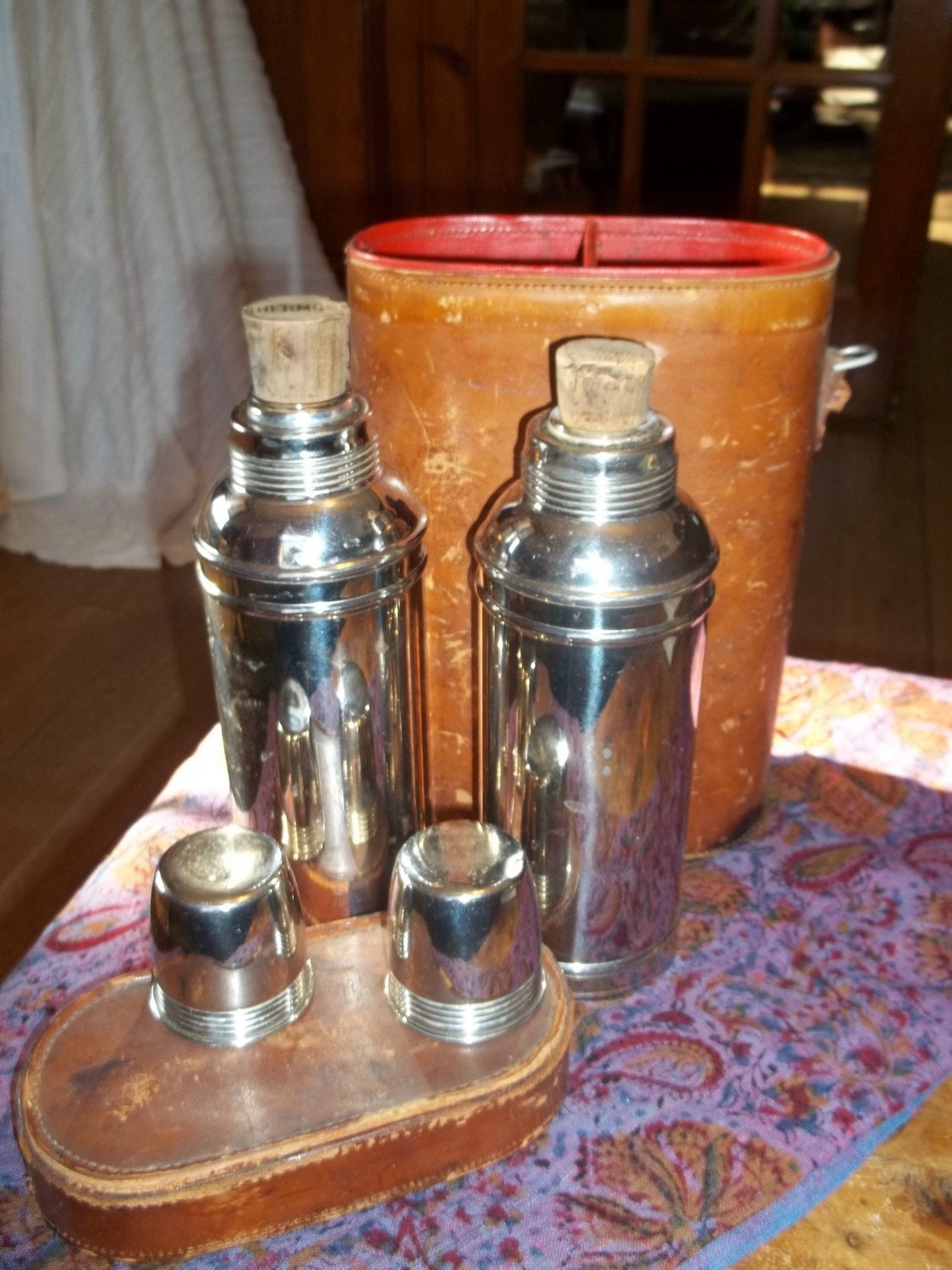 Reduced 100 year old thermos set