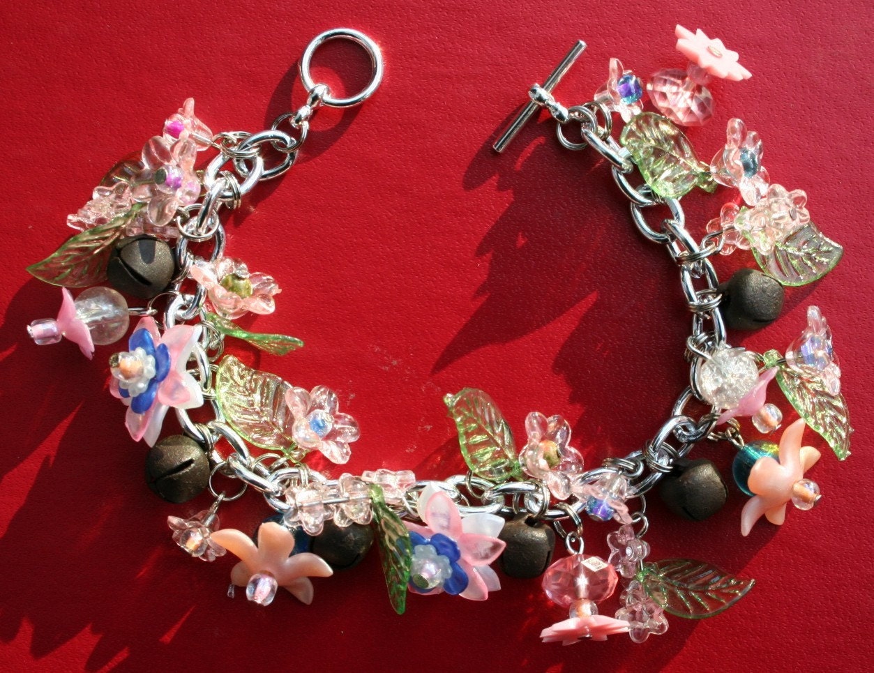 CLEARANCE SALE ...Pretty Pink Flowers and Bells Charm Bracelet