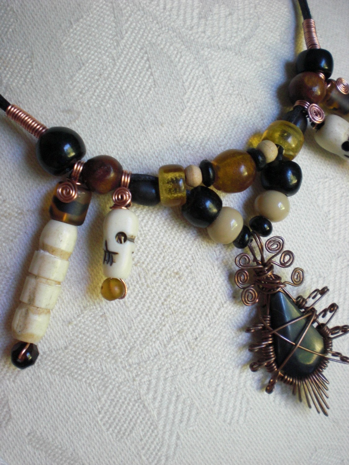 The Nomad Pirate Skull, Bone, Wrapped Stone, Glass and Wood Necklace Hand Wrapped Copper Travel Collar with Beads from All Over the World