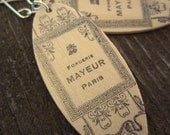 French label wood earrings