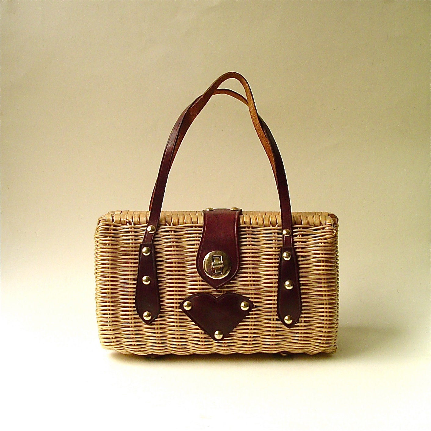 R e s e r v e d..............................Mid Century vintage Woven Rattan Purse with Leather Trim