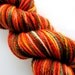 Aran Organic Merino "Spirited Away 1" Red, Yellow, Orange, Green, Purple