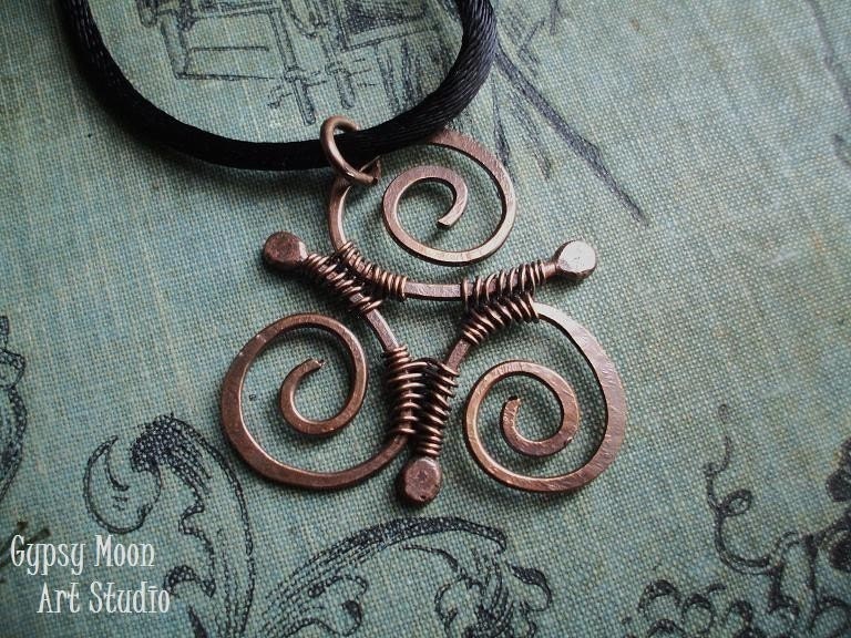 Celtic Triskele- copper wire wrapped pendant