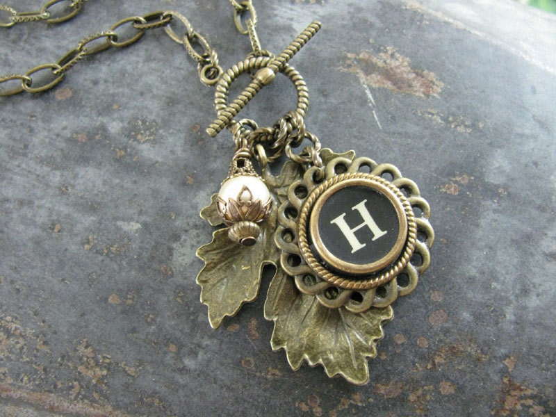 Autumn Brass Maple Leaf with Black Typewriter Key and Cream Pearl Charm Necklace on Toggle Clasp