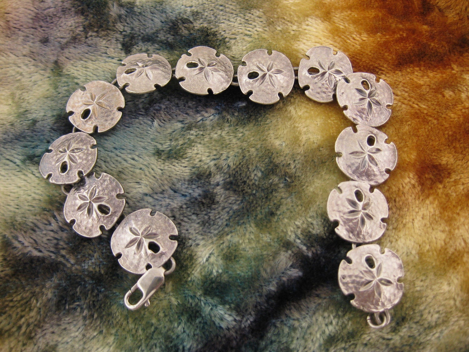 Attractive Sand Dollar Sterling Silver Bracelet