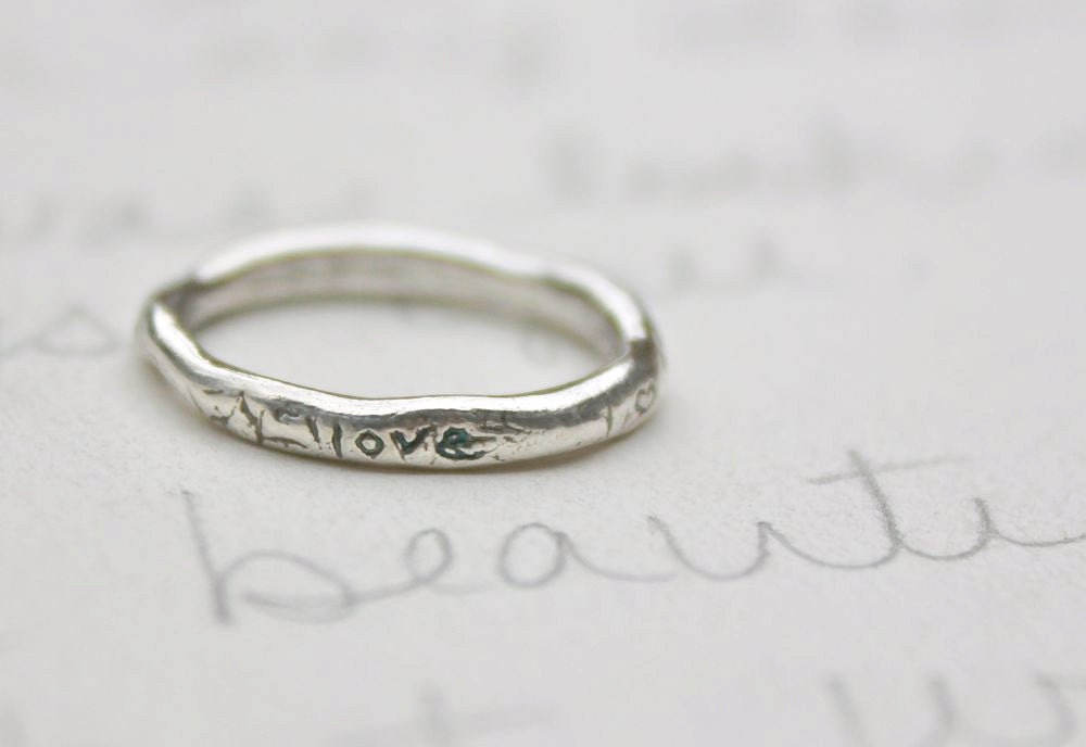 reserved for R . skinny silver wedding ring with arrow . recycled silver . size 5.75 rounded silver stacking band by peacesofindigo