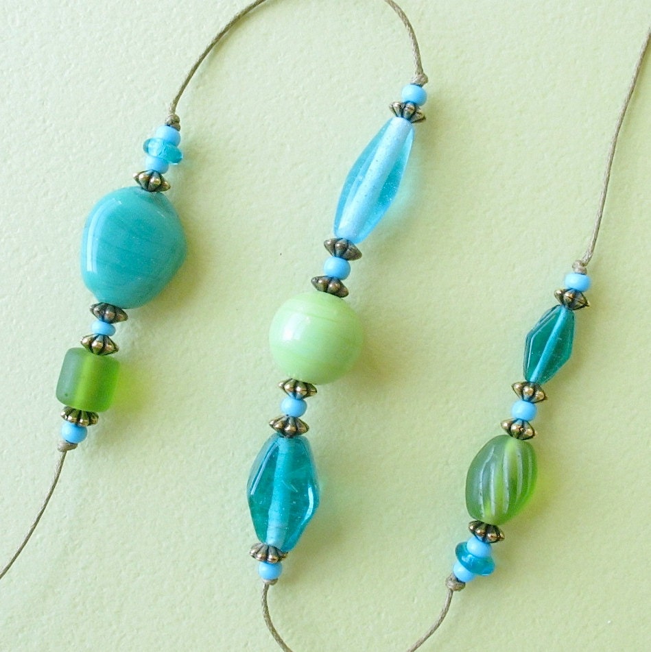 Beaded Garden Chime: Windchime with Aqua, Turquoise, Olive & Teal Green Glass Beads. Brass Bell