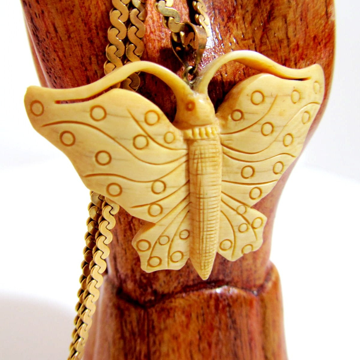 Vintage ivory celluloid butterfly pendant