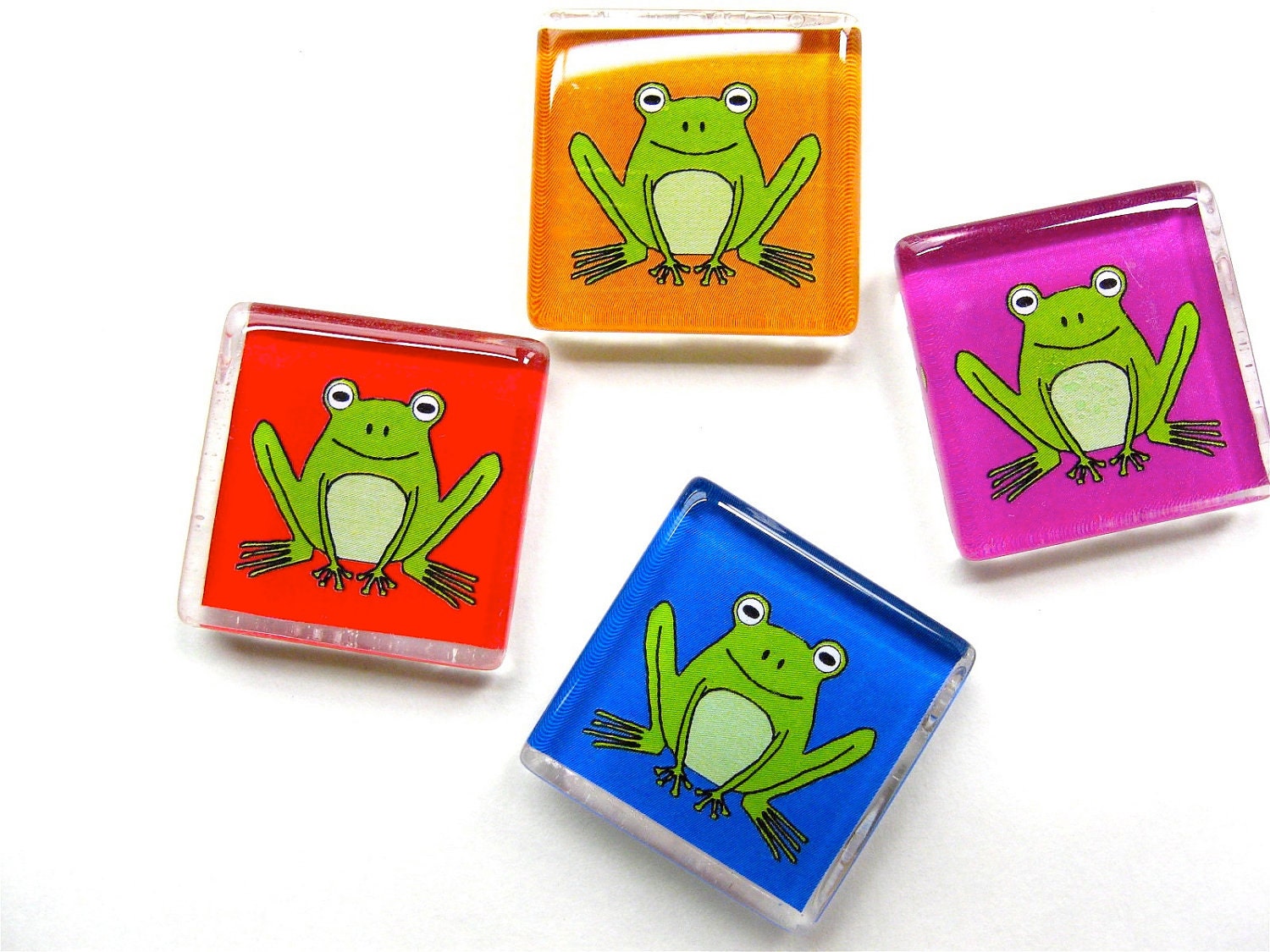 Frog magnets -- Set of four on Orange, Magenta, Blue and Red