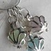 Sea Glass Necklace- Triple the Seashell Lockets in Pastels