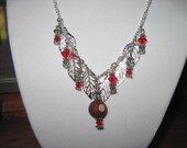 Buckeye Necklace with silver leafs Red and Gray Swarovski Crystals