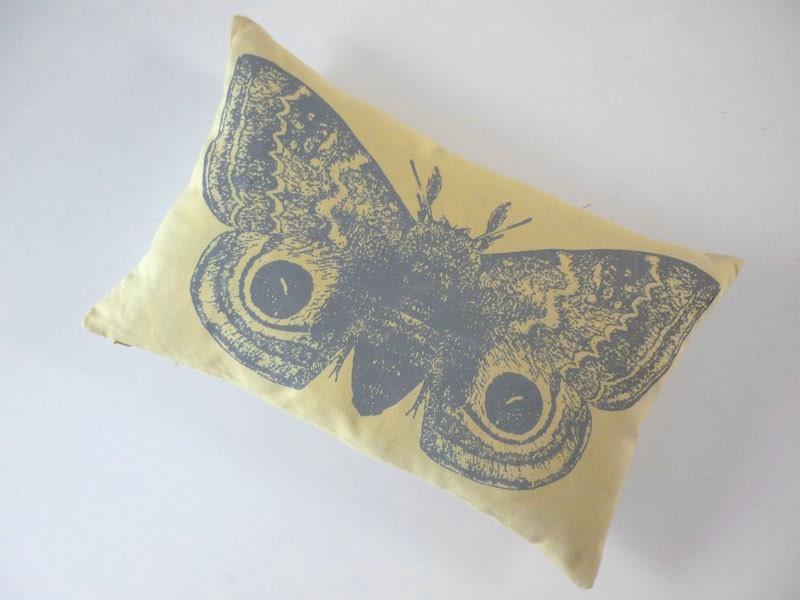 IO Moth silk screened cotton canvas throw pillow 12x18 gray on light yellow canvas