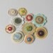 SALE................A Touch of Vintage - Paper and Button Embellishments x 10