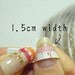 Japanese gothic lolita nails, Sonoko, bows and hearts on black nails