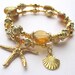 Beaded Memory Wire Bracelet with Starfish And Scallop Shell Charms- VR
