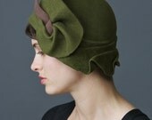 Ornately draped olive\/brown cloche hat