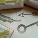 treasure rubber stamps. hand carved rubber stamp. hand carved stamp. key/feather/arrow. set of 3. mounted.