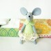 Green mouse miniature plush in matchbox bed with lace