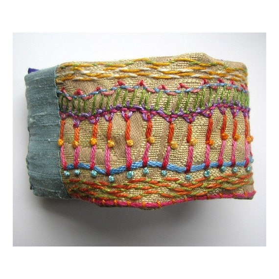 Hand Embroidered Multi-Colored Cuff with Orange Buttons