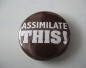 Assimilate this 1 inch pinback button / magnet