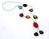 Tagua nut/Vegetable Ivory Triangles in Butterscotch. Sold by 2 pieces. - NatureBeads