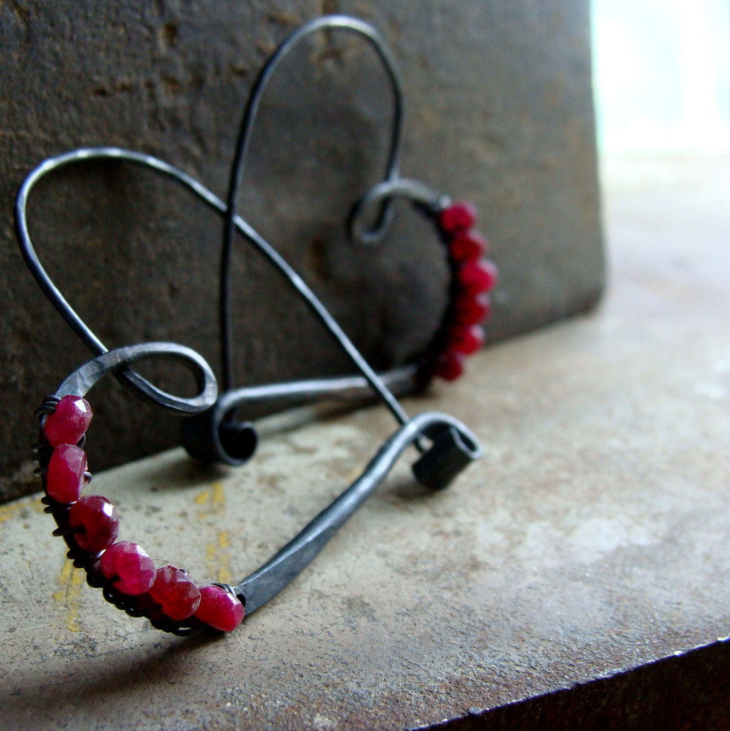 oxidized sterling silver heart hoop with faceted ruby beads