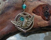 The Hunger Games Inspired Token Necklace with Teal Crystals