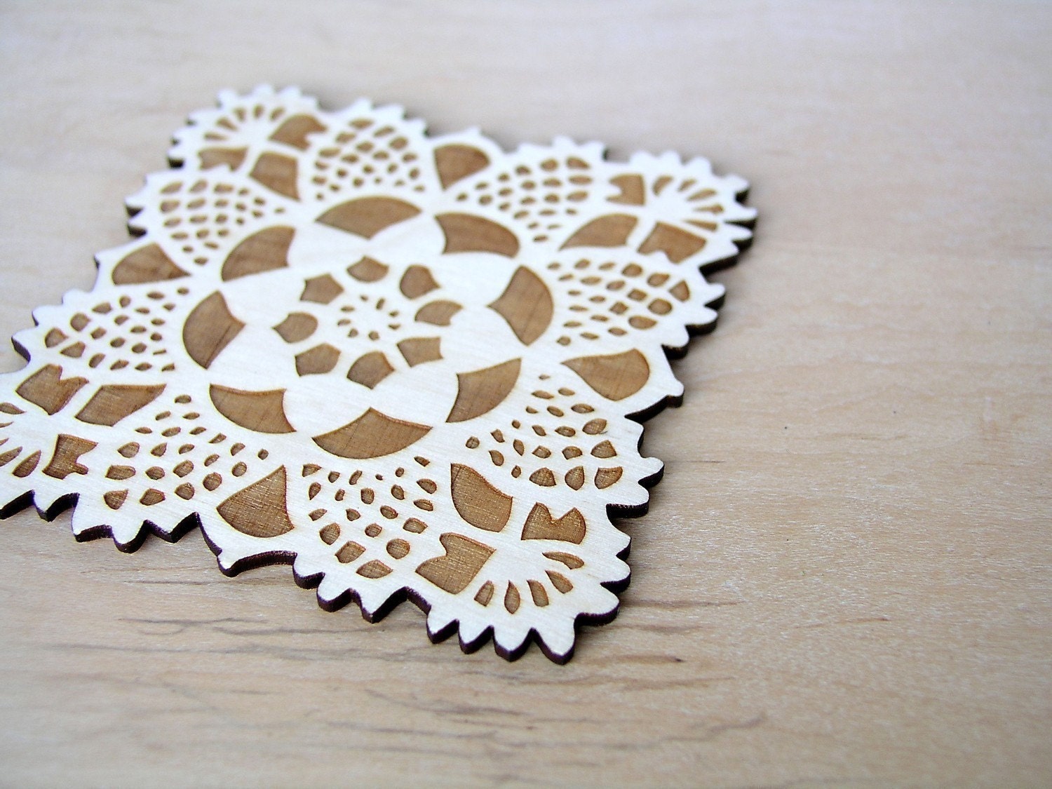square doily coasters with natural woodgrain