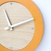 tangerine creamsicle modern wall clock