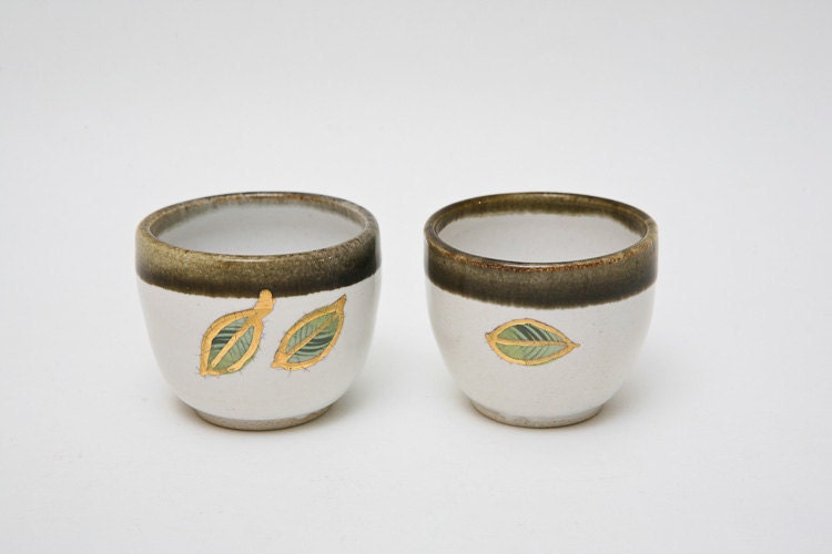 Wheel Thrown stoneware gold leaf tea cup pair