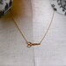 The Tiny Brass Scissors Necklace