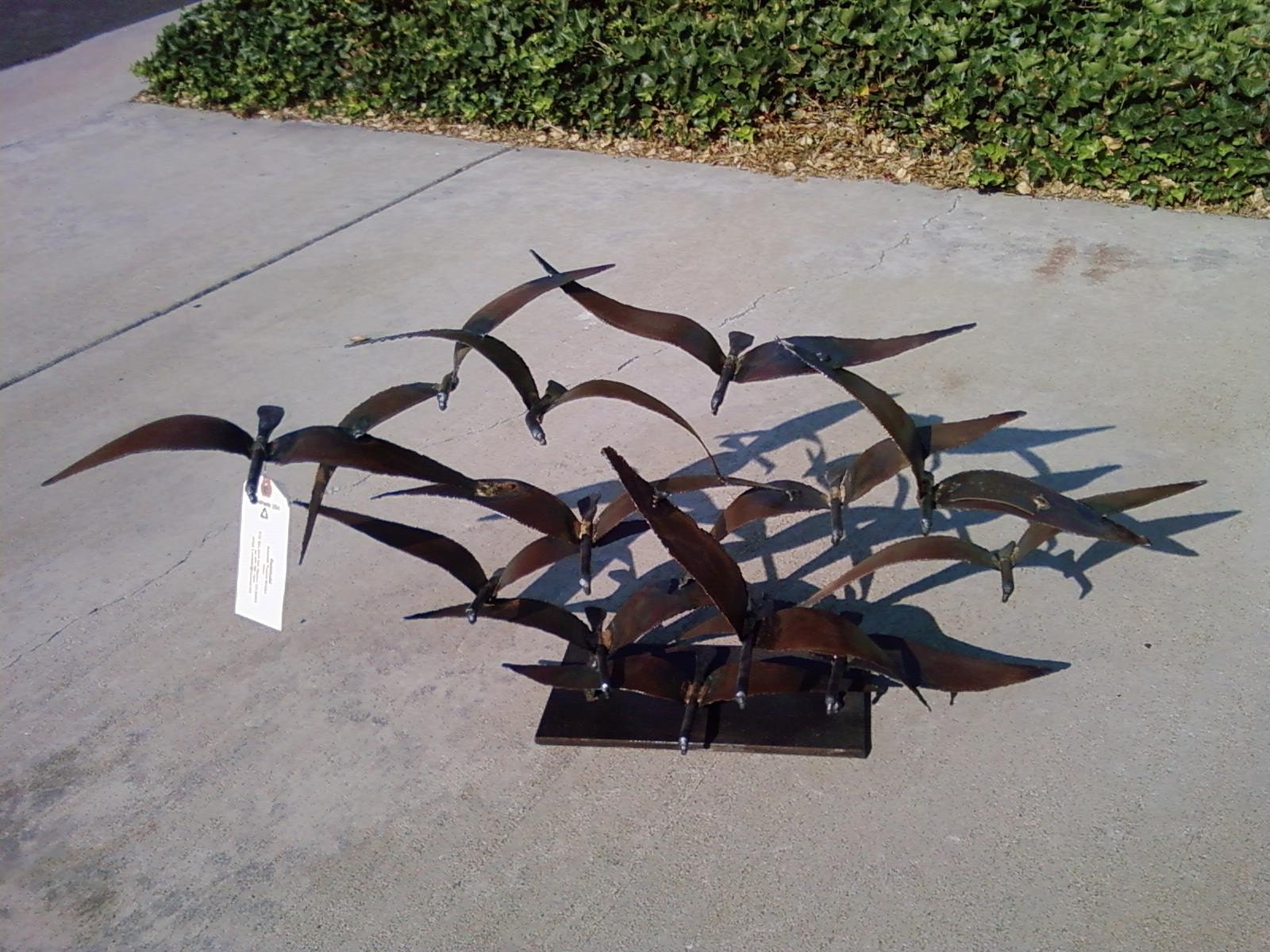 hand made steel flocking birds
