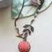 A Soft Coral Chrysanthemum, Dahlia Flower, Flying Bird, and Leaf Branch with Ivory Pearls Necklace. Gift Ideas for Bridesmaids.