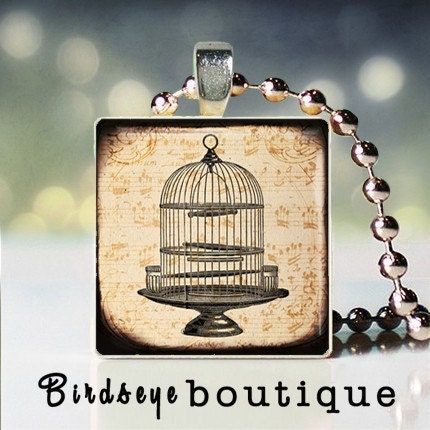 Escaped scrabble tile pendant