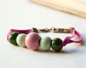 Ceramic Bracelet - Pink and green ceramic beads and pink ribbon -ceramic jewelry - porcelain jewelry - holiday jewelry - emeeme