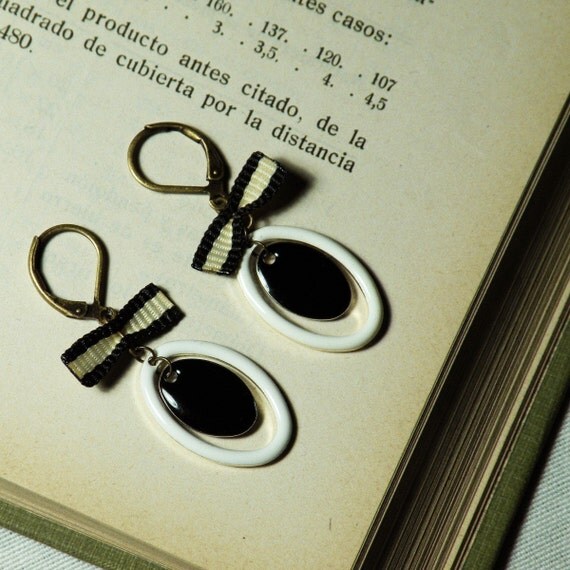 Oval black and white enameled earrings